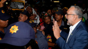 Expelled South African ambassador welcomed home from US