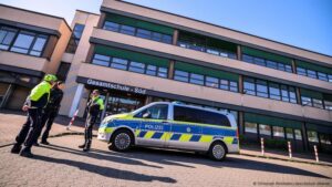 German police probe 4 teen suspects over school threats