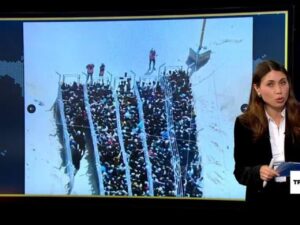 Real images of Palestinians lining up for aid accused of being AI-generated