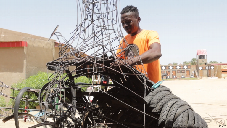 Artists highlight hazards of abandoned tires