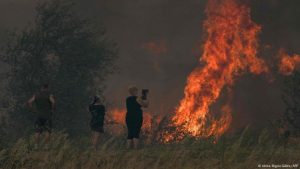 France wildfires scorch land larger than Paris, still raging