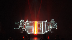 Ferrari unveils chassis of its first electric car, but shares plunge as financial outlook disappoints