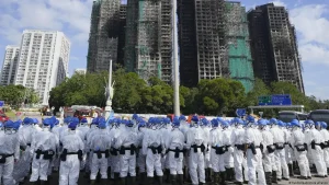 Hong Kong fire critics detained under National Security Law
