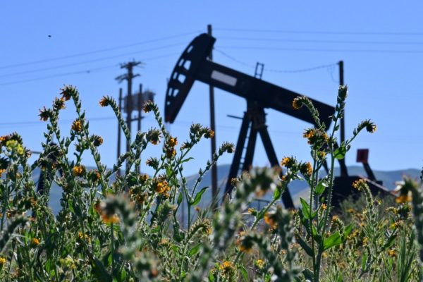 Oil markets swing on stockpile release and Hormuz Strait mine reports