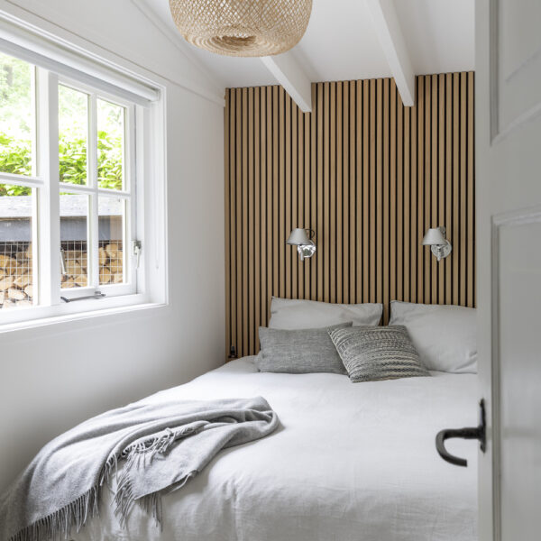 Slaapkamer met tweepersoonsbed in Appelscha