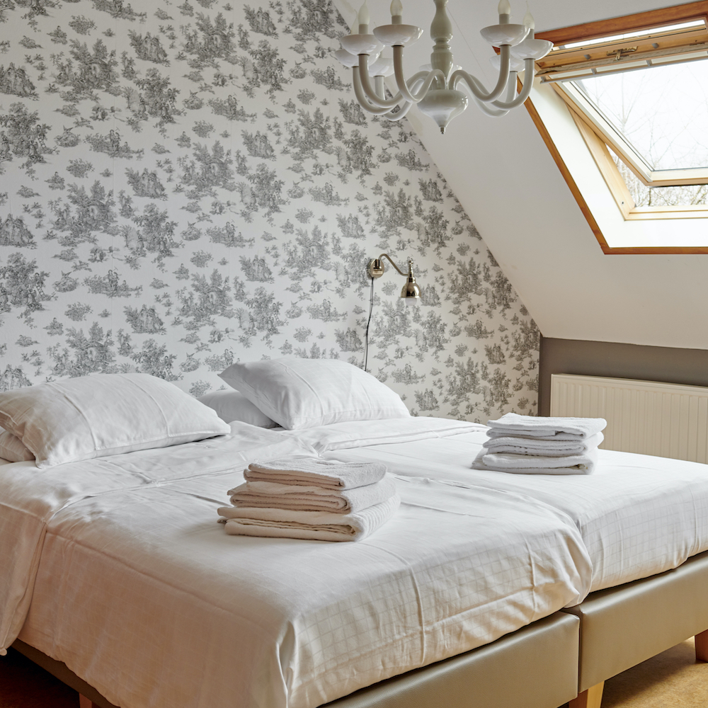 Slaapkamers met ruimte genoeg voor een extra bedje.