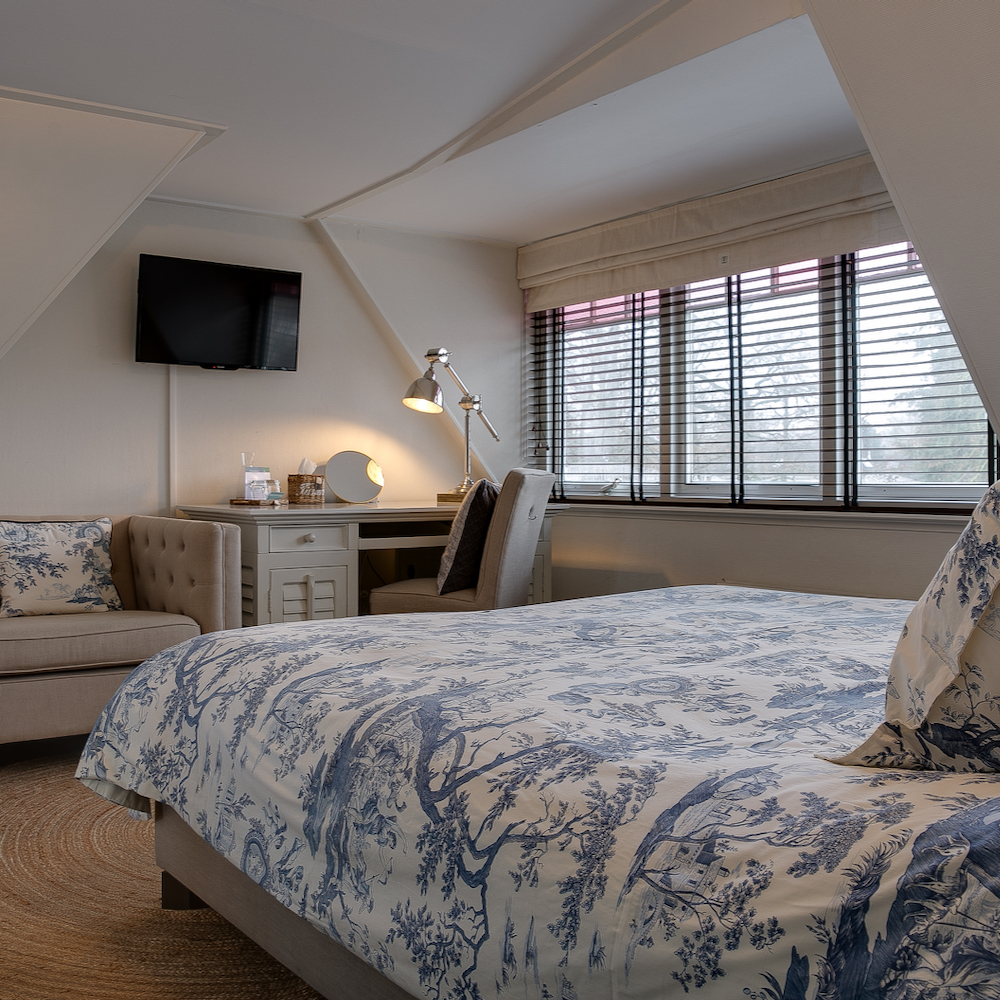 Kamer met Riviera Maison interieur in het hotel