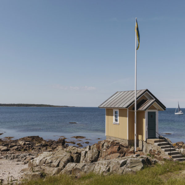 Geel strandhuisje in Skåne