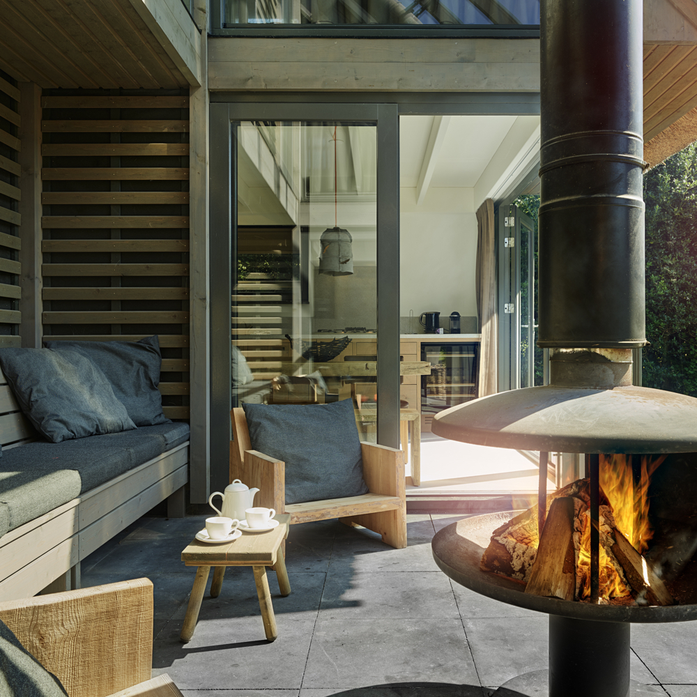 Overdekte veranda van een luxe vakantiehuis in Schoorl