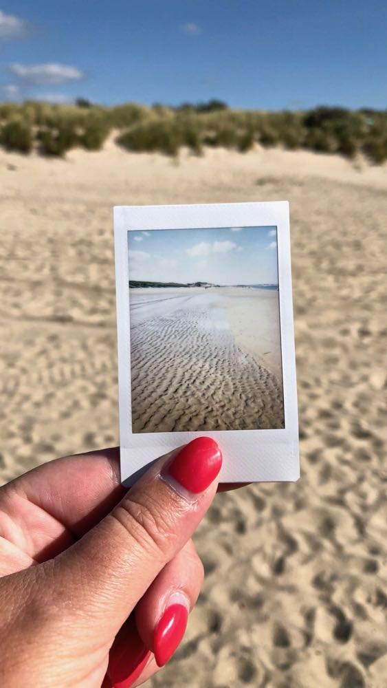 Een polaroid foto voor de duinen