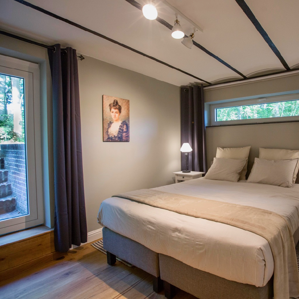 Een van de slaapkamers van het Atelier van Antonine