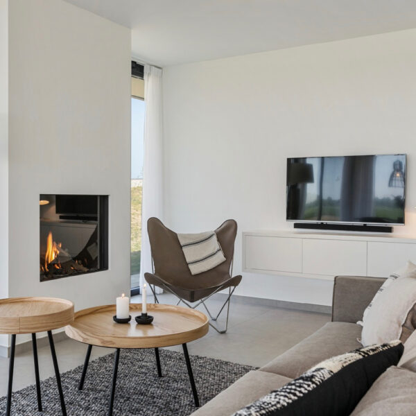 Vlinderstoel bij de haard