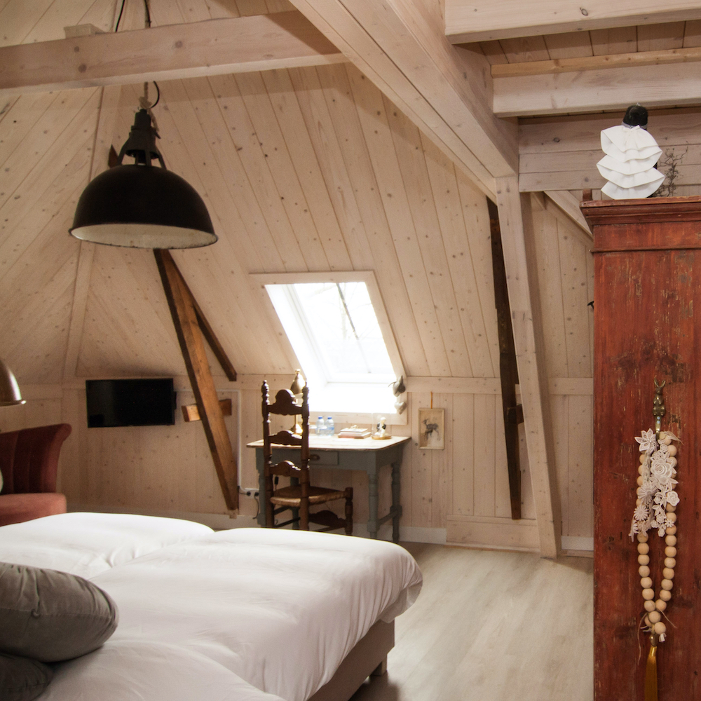 Romantische hotelkamer bij Herberg in Den Ham