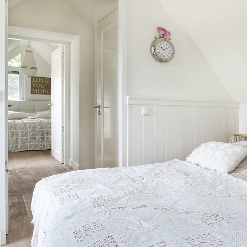 Slaapkamer in het vakantiehuis in Schoorl op een klein park aan zee