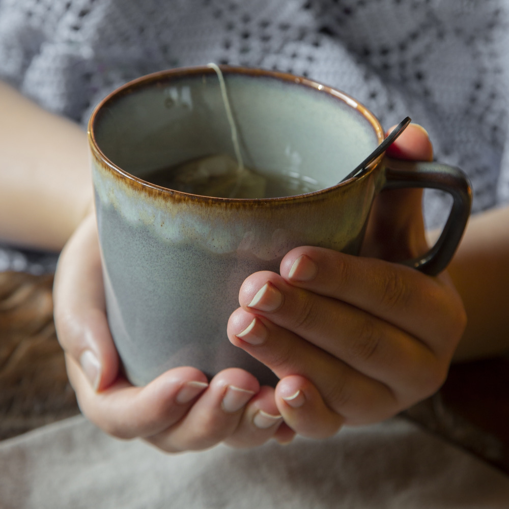 Kopje van HK Living met thee