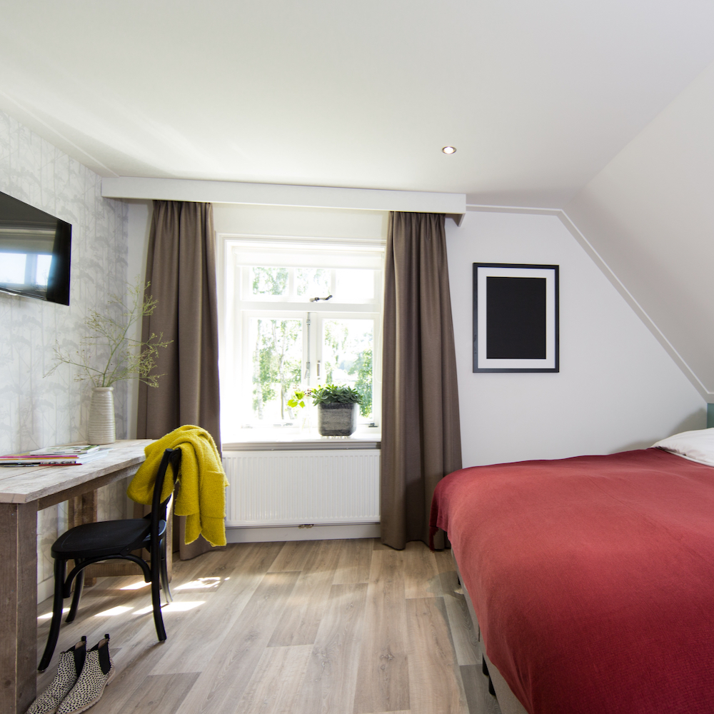 Slaapkamer met privé badkamer in Overijssel