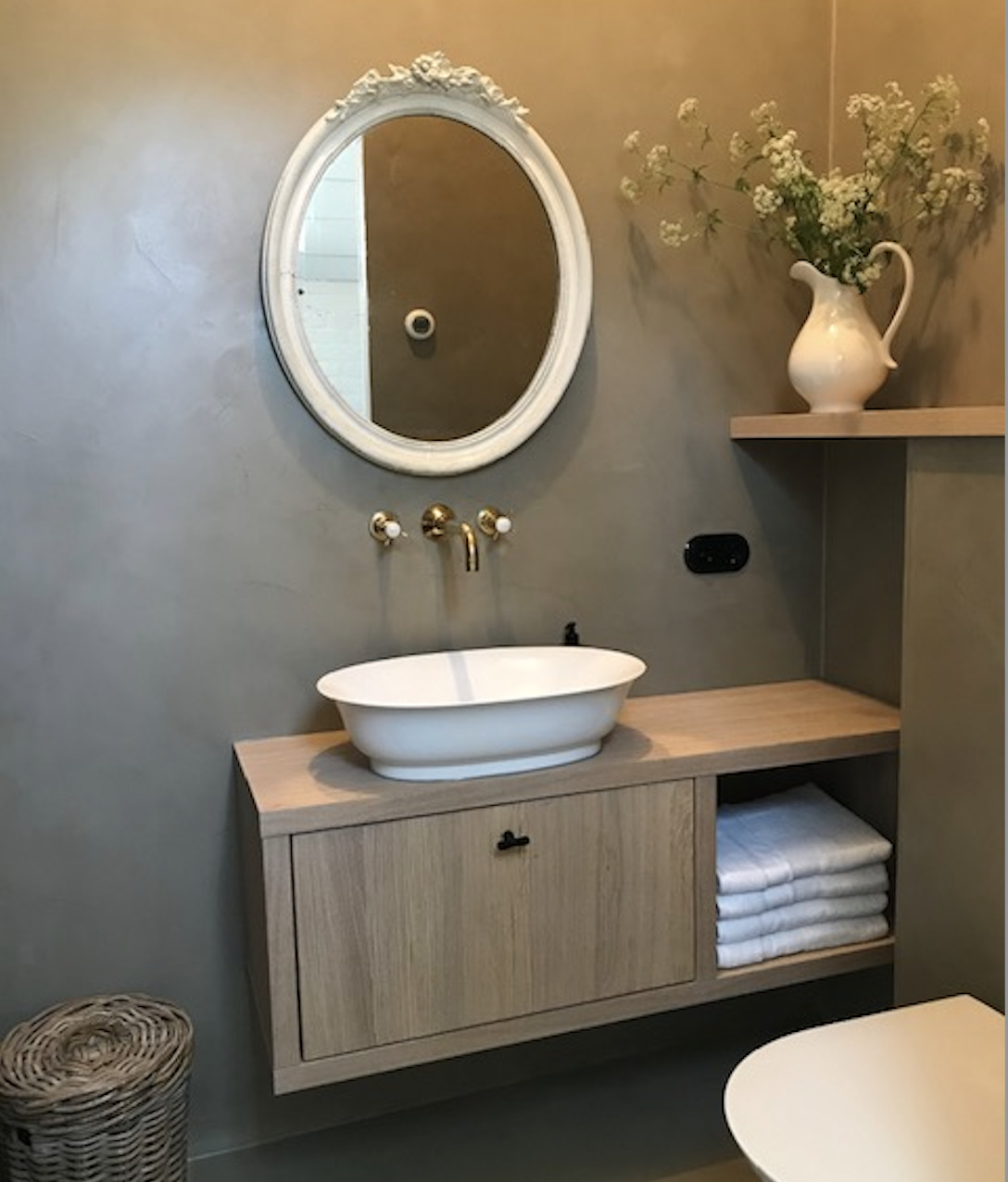 Badkamer in het vakantiehuis met betonlook