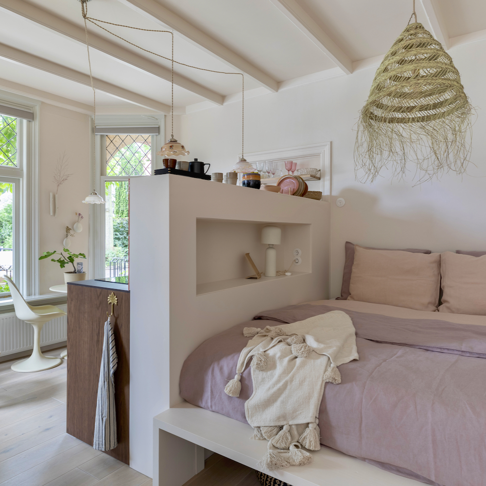 Tweepersoons bed in het knusse appartement in Bergen