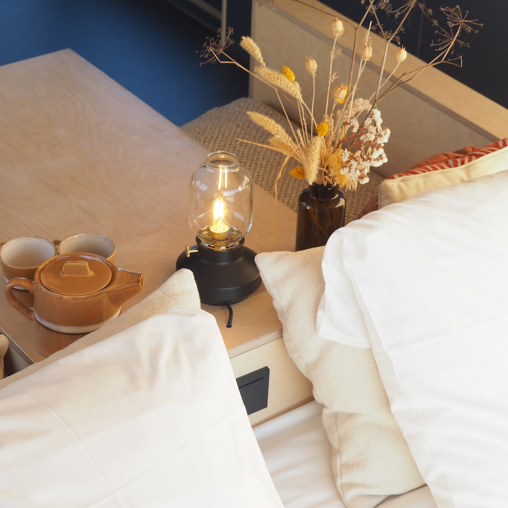 Kussens op het bedhoofd