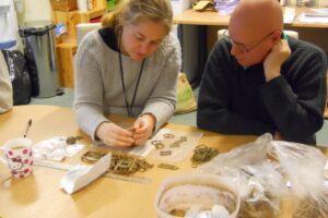 Laura Burnett Somerset FLO examining finds 1