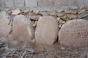 Coral stones inscribed with gujarati script