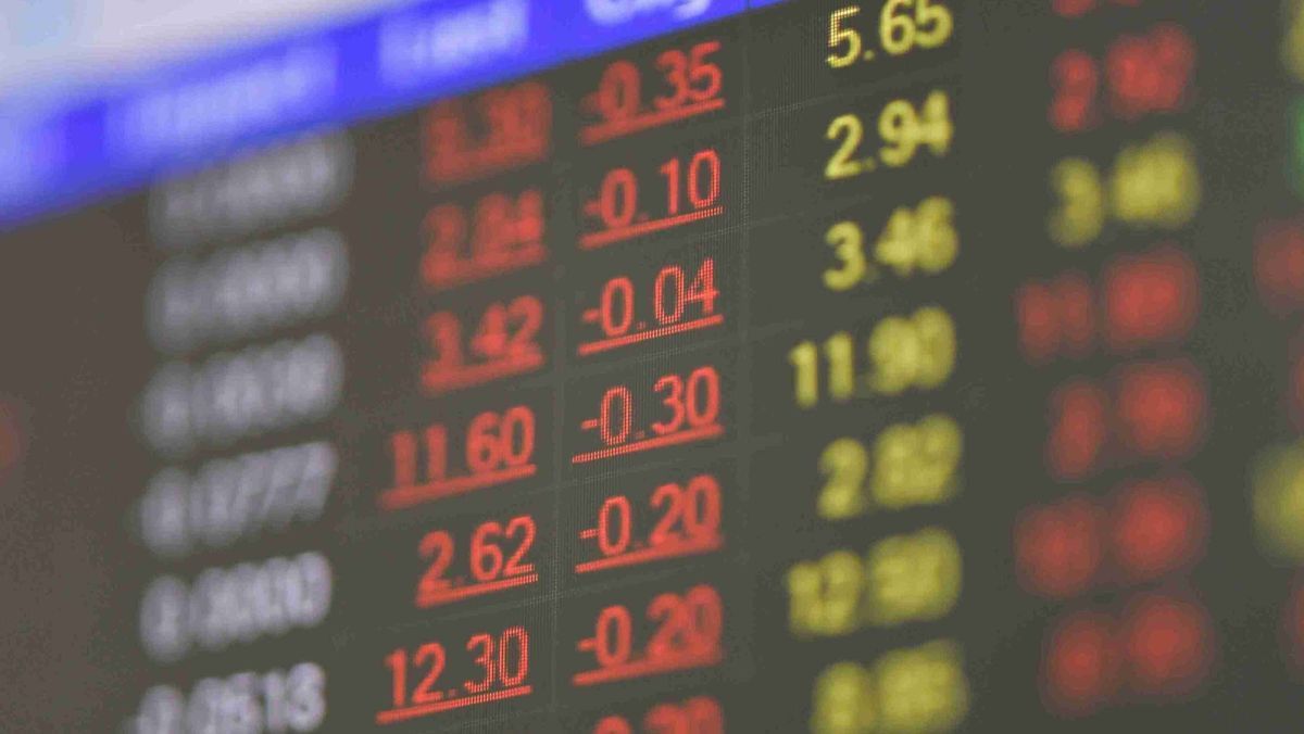 A blurry set of numbers in colour white, yellow, and red on a digital panel