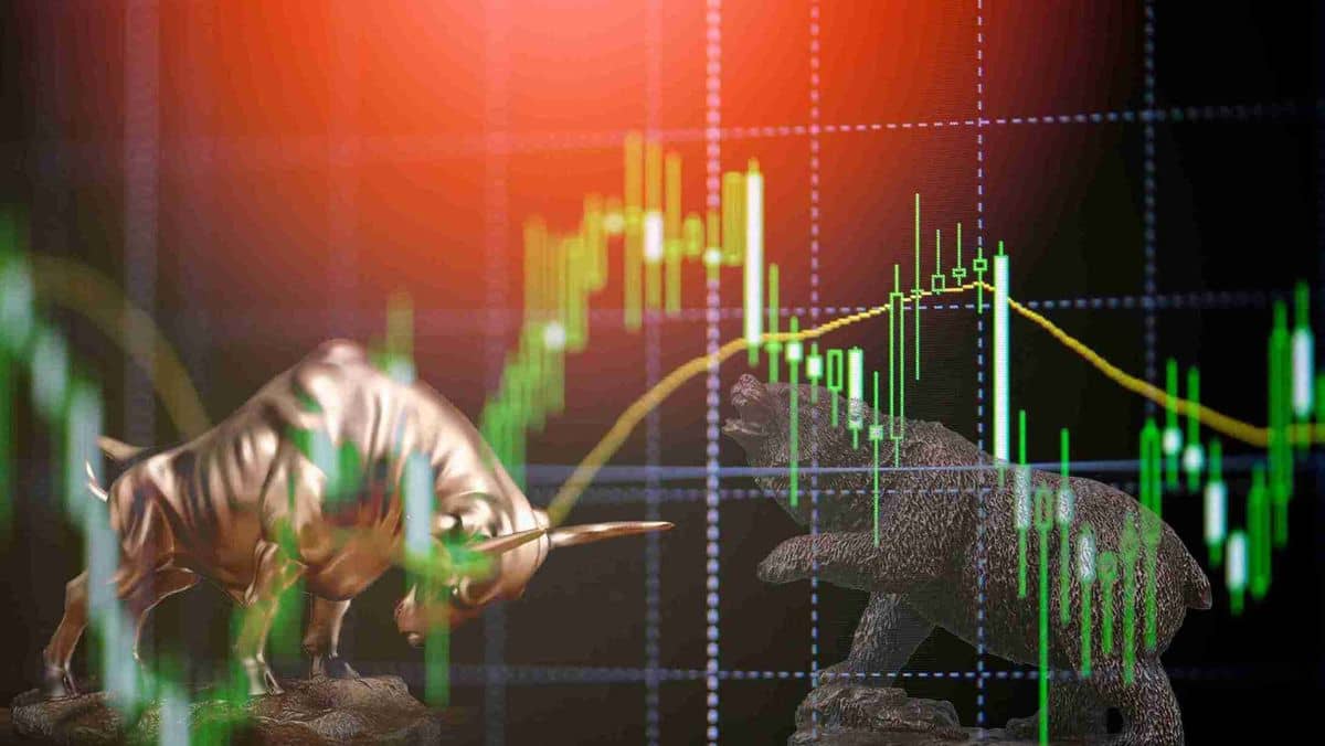 A depiction of a bull and bear figure amidst green trading patterns