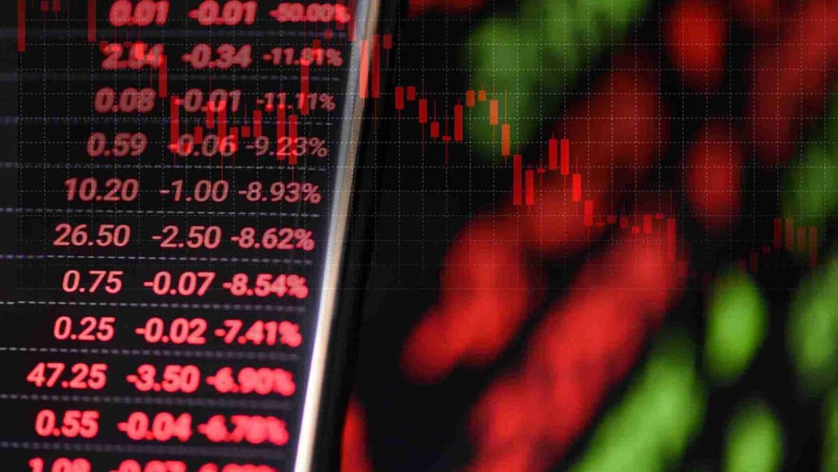 Red-hued numerical values of stock prices showcased on a digital screen