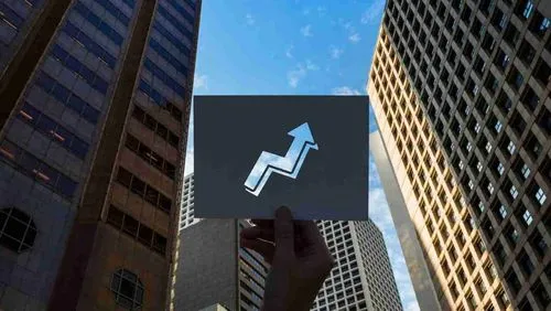 A piece of paper displaying a central cutout shaped like an upward arrow set against a skyline of buildings