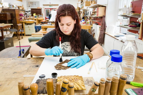 Female furniture student in the workshop at West Dean College of Arts and Conservation