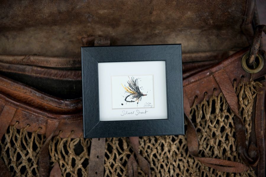 Silver Stoat fishing fly illustration in a black frame