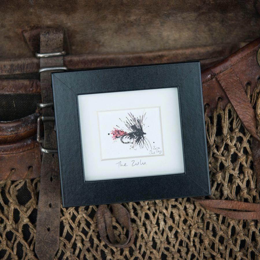 The Zulu fishing fly illustration in a black frame