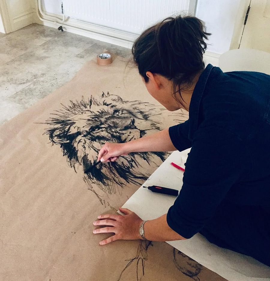 Oil painting of a lion in progress
